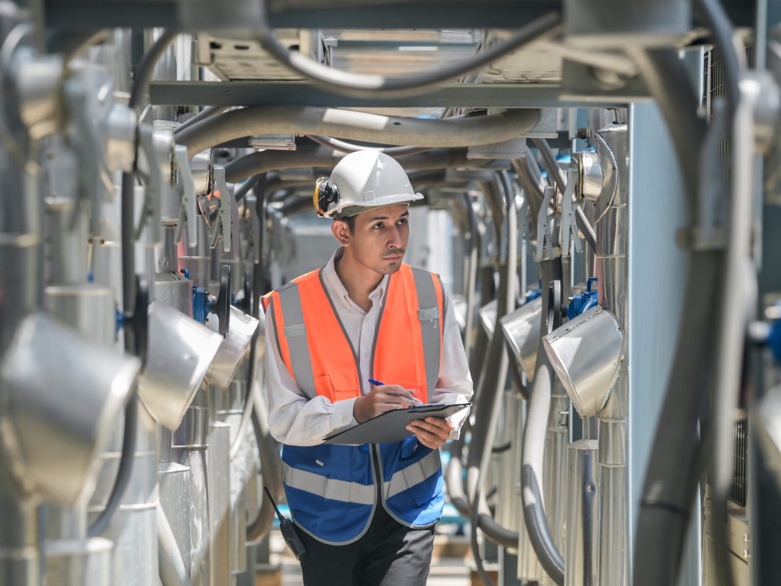 Engineer assessing equipment