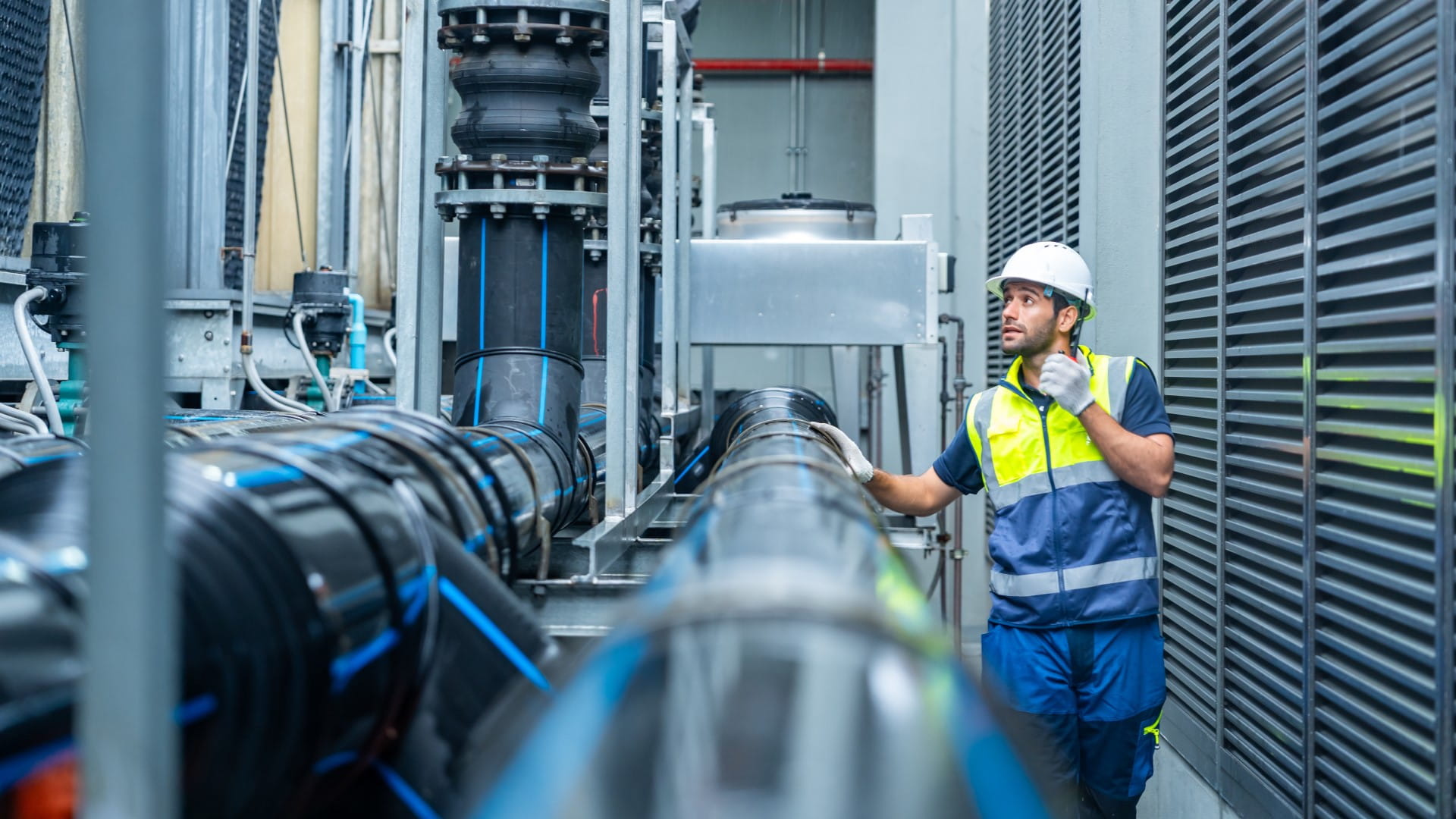 Engineer viewing machinery